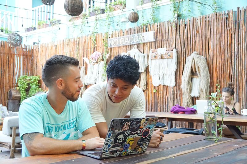 Two digital nomads working, Playa del Carmen.