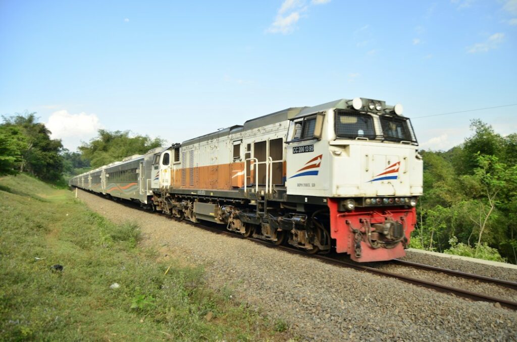 Thai passenger train representing the Bangkok to Chiang Mai rail journey