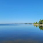 Corozal Bay coastline in Belize, illustrating the Work Where You Vacation remote-work guide